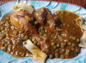 Una foto de Muslitos pollo con salsa de vermú rojo