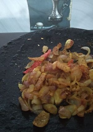 A picture of Tawa Fry Onions.