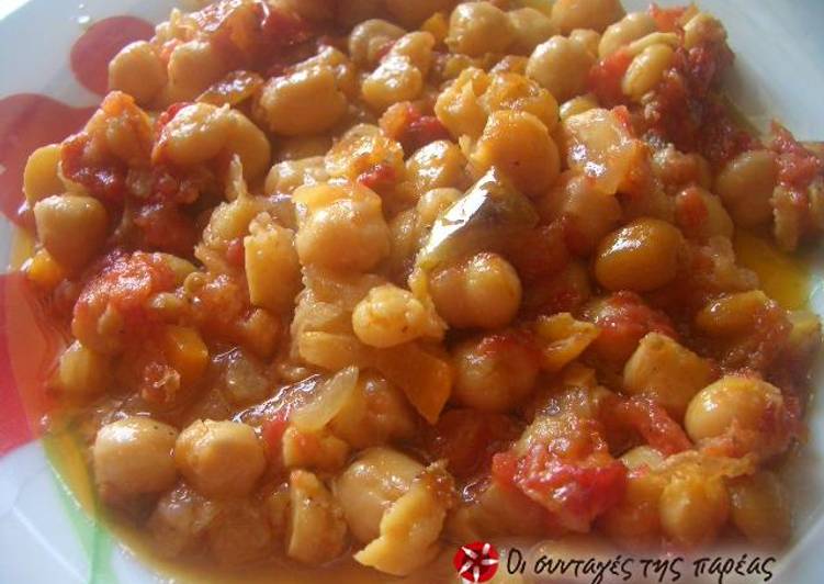 Chickpeas cooked in a terracotta casserole dish