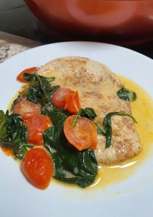 Una foto de Filetes de pollo a la toscana