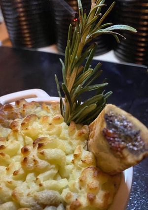 A picture of Short rib & rosemary potato pie.