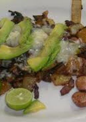 Una foto de Tacos del Chef gratinados