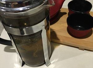 Una foto de Infusión de menta-canela-jengibre-té verde