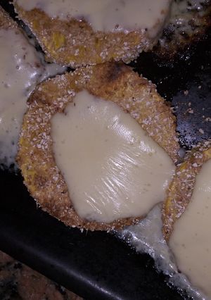 Una foto de Milanesas de calabaza, jamón y queso