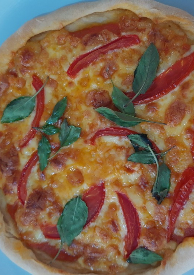 Una foto de Pizza margarita