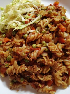 A picture of Spiral pasta in minced meat.