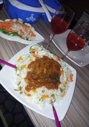 A picture of Veggies rice and stew.