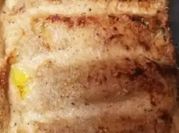 Una foto de crepes rellenos de marisco