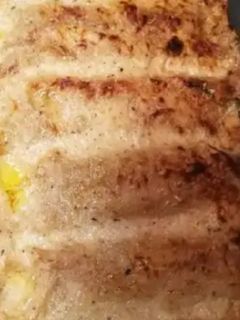 Una foto de Canelones de merluza, gambas y setas con masa de crêpes 🍄‍🟫🦐