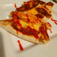 A picture of Sriracha cheesey ham wraps.