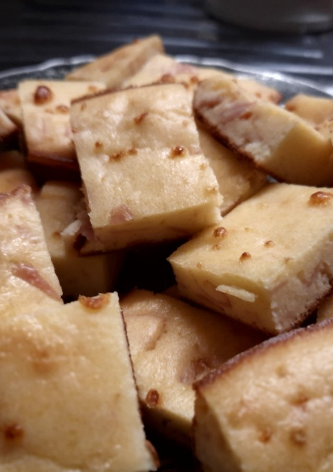 Una foto de Fainá de queso y jamón