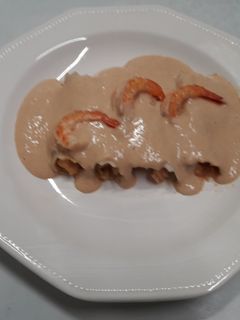 Una foto de Canelones de rape y langostinos