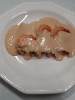 Una foto de Canelones de rape y langostinos