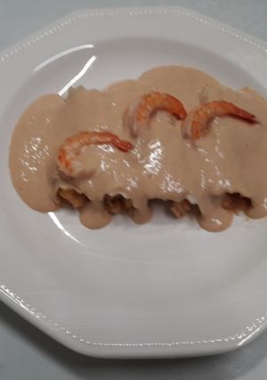 Una foto de Canelones de rape y langostinos