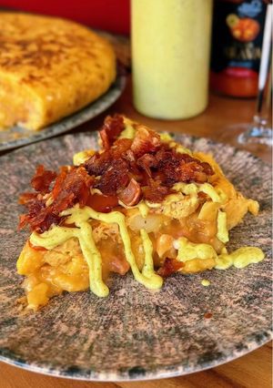 A picture of Spanish Potato Omelette with Crispy Pork Ear.