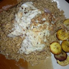 A picture of Indomine and fried plantain.