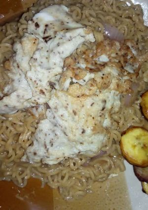 A picture of Indomine and fried plantain.