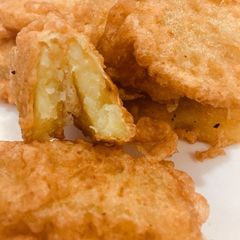 A picture of Sweet potatoes coated in egg.