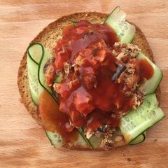 A picture of Sardine And Cucumber On Buttered Pita Bread.