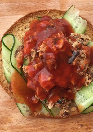 A picture of Sardine And Cucumber On Buttered Pita Bread.