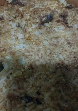Una foto de Tortilla de arroz, zapallito y cebolla