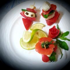 Christmas apero with tomato and mozzarella cheese A picture of Christmas apero with tomato and mozzarella cheese.