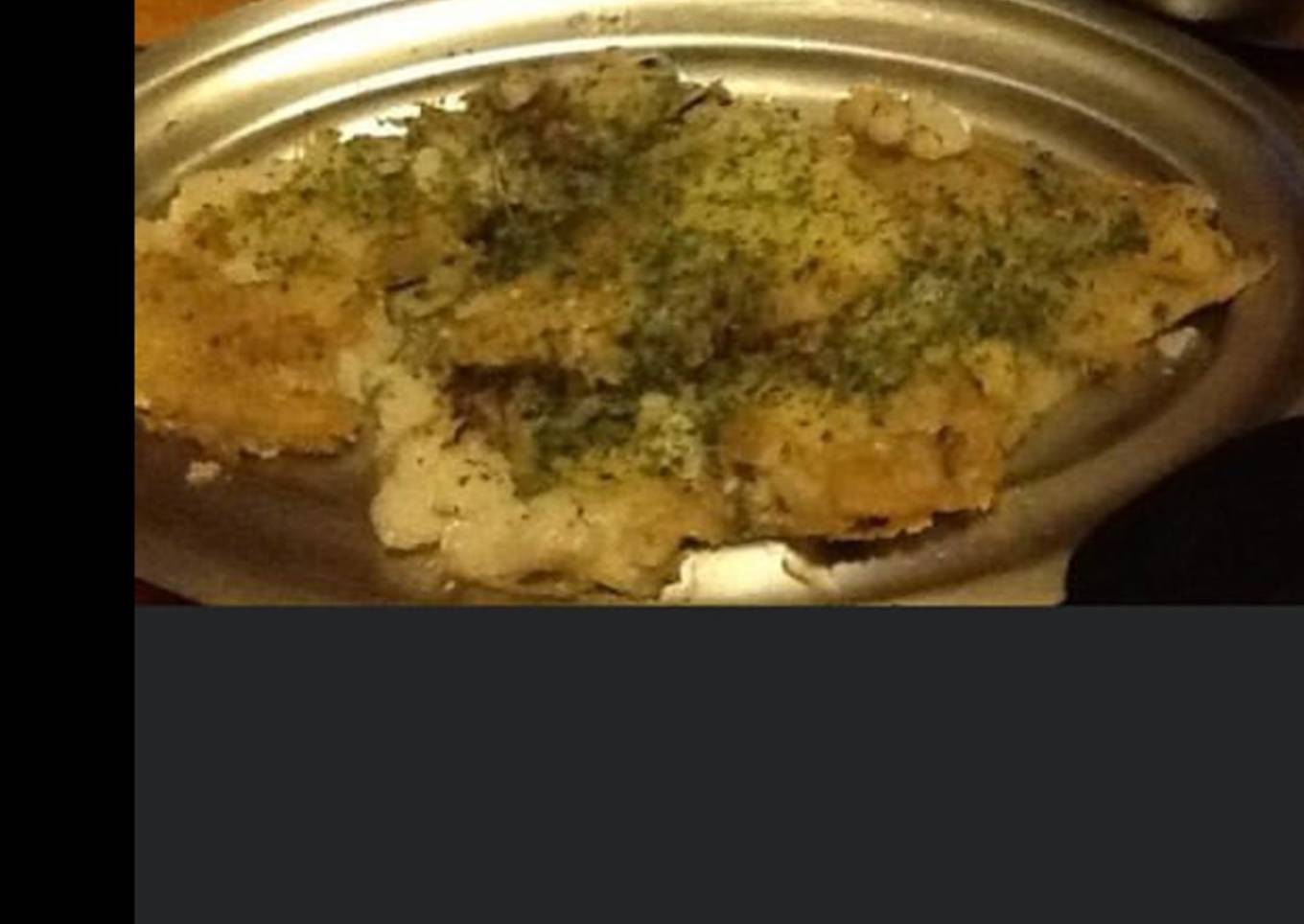 Filets de cabillaud pané et ses oignons confits