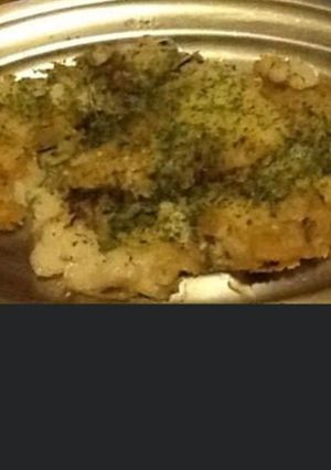 Une photo de Filets de cabillaud pané et ses oignons confits