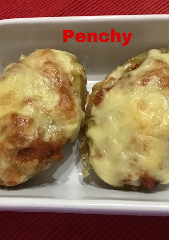 Una foto de Nidos de patata con salsa boloñesa y queso Edam