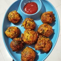 Methi, spring onion appe A picture of Methi, spring onion appe.
