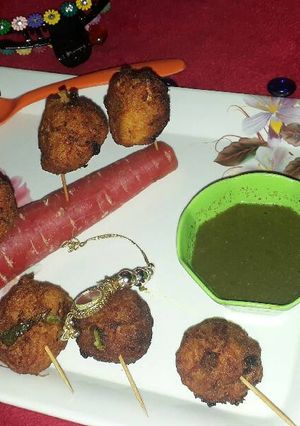 A picture of Carrot lollipops.