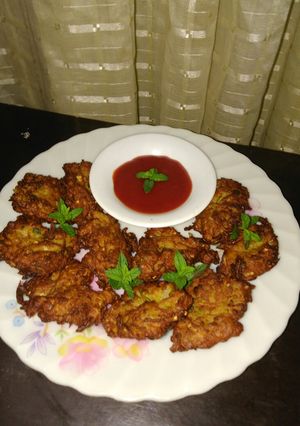 A picture of Kadu ke pakory(pumpkin fritters).