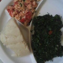 A picture of Ugali fried eggs and fried kales.