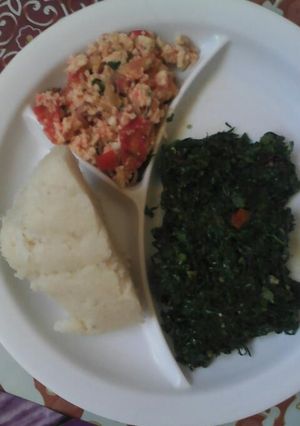 A picture of Ugali fried eggs and fried kales.