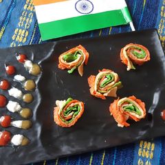 A picture of Tri colour suji pancake Swiss roll.