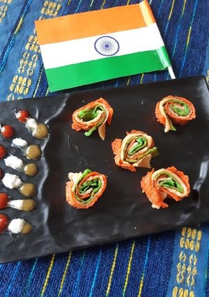 A picture of Tri colour suji pancake Swiss roll.