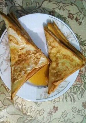 ডিম পাউরুটি ওমলেট রেসিপির প্রধান ছবি