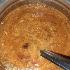A picture of Tamarind rasam.