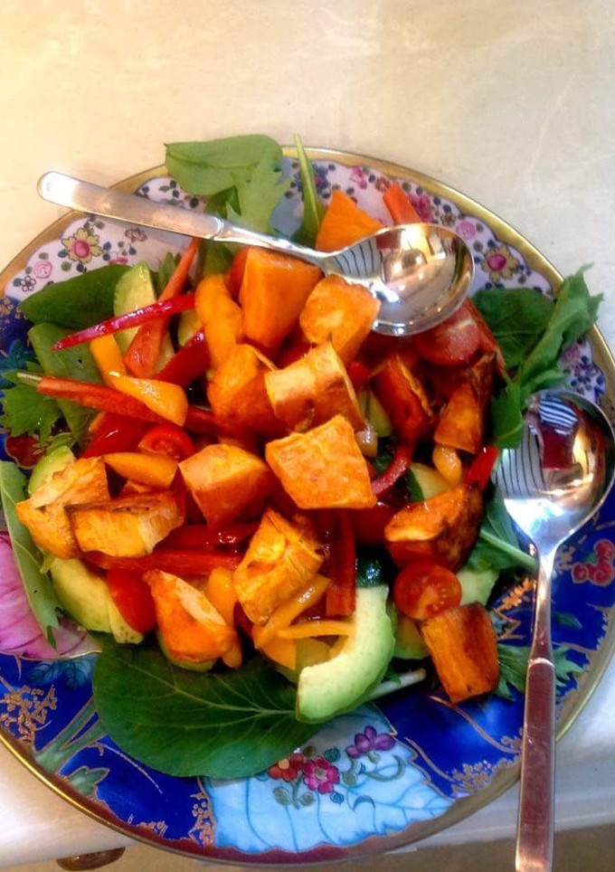 A picture of Roasted sweet potato and avocado salad.