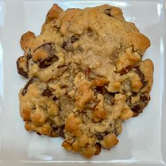 A picture of Chocolate chip cookies, thick with crispy edges.