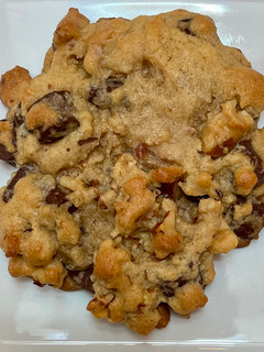 A picture of Chocolate chip cookies, thick with crispy edges.