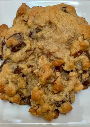 A picture of Chocolate chip cookies, thick with crispy edges.