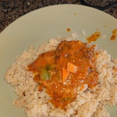 A picture of Fish curry saved with fried onion rice.