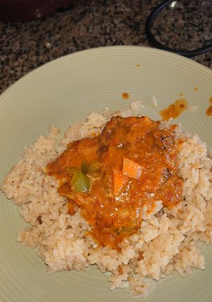 A picture of Fish curry saved with fried onion rice.