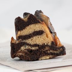 A picture of Peanut Butter Chocolate Cake with Peanut Butter Sauce.