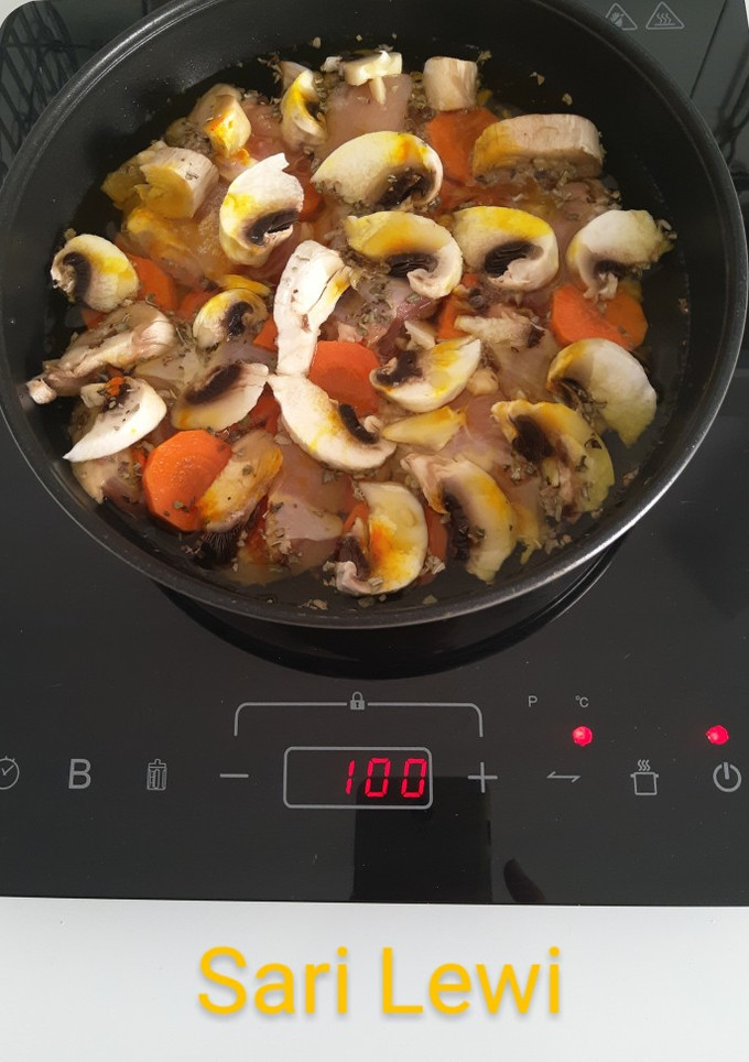 Una foto de Paella en Placa de inducción (10 ingredientes)