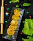 Spinach-Cottage cheese Schezwan Ravioli (eggless)