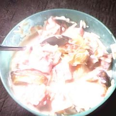 A picture of Mixed fruits with milk.