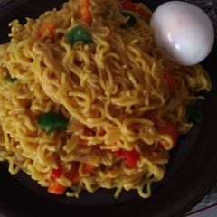 Indomine with carrots,egg and green pepper A picture of Indomine with carrots,egg and green pepper.