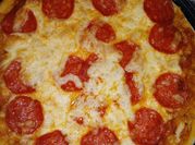 Una foto de pizza al orégano